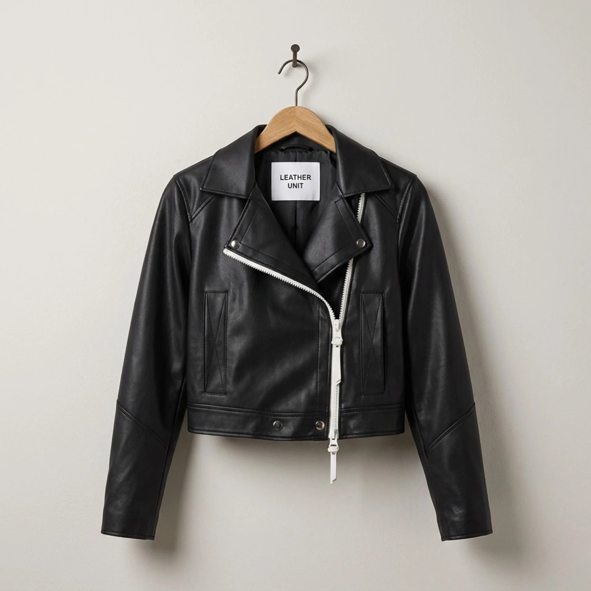 Front view of women’s black cropped leather moto biker jacket by Leather Unit