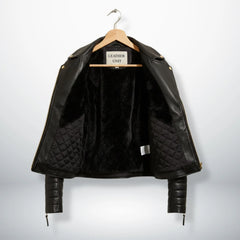 inside view womens black leather jacket with faux fur and quilted lining.