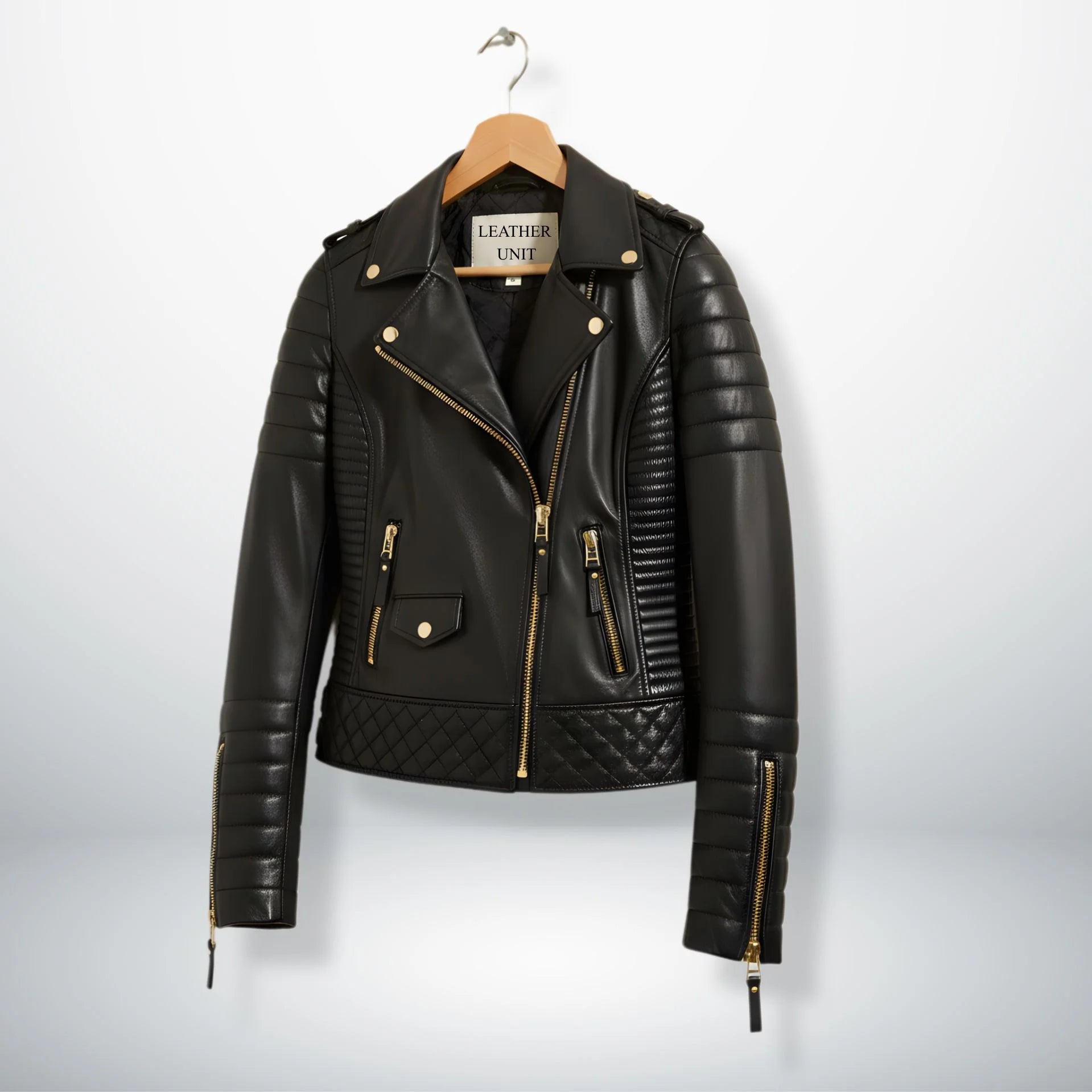 angled front view womens black slim fit moto jacket with gold hardware.