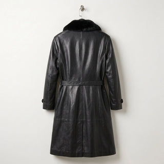 Back view of long women’s black leather trench coat with belt