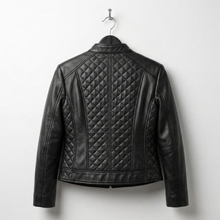 Back view of women’s black quilted leather moto jacket