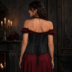 Rear model view of black satin underbust corset showing adjustable black lacing, metal eyelets and sculpted waist shape.