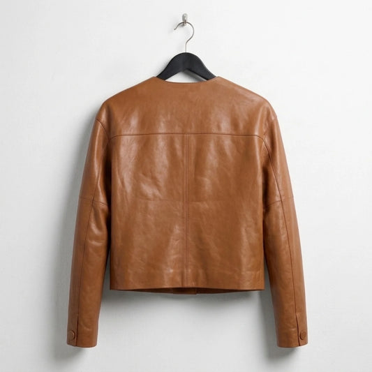 Back view of women’s camel brown collarless leather jacket