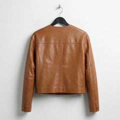 Back view of women’s camel brown collarless leather jacket