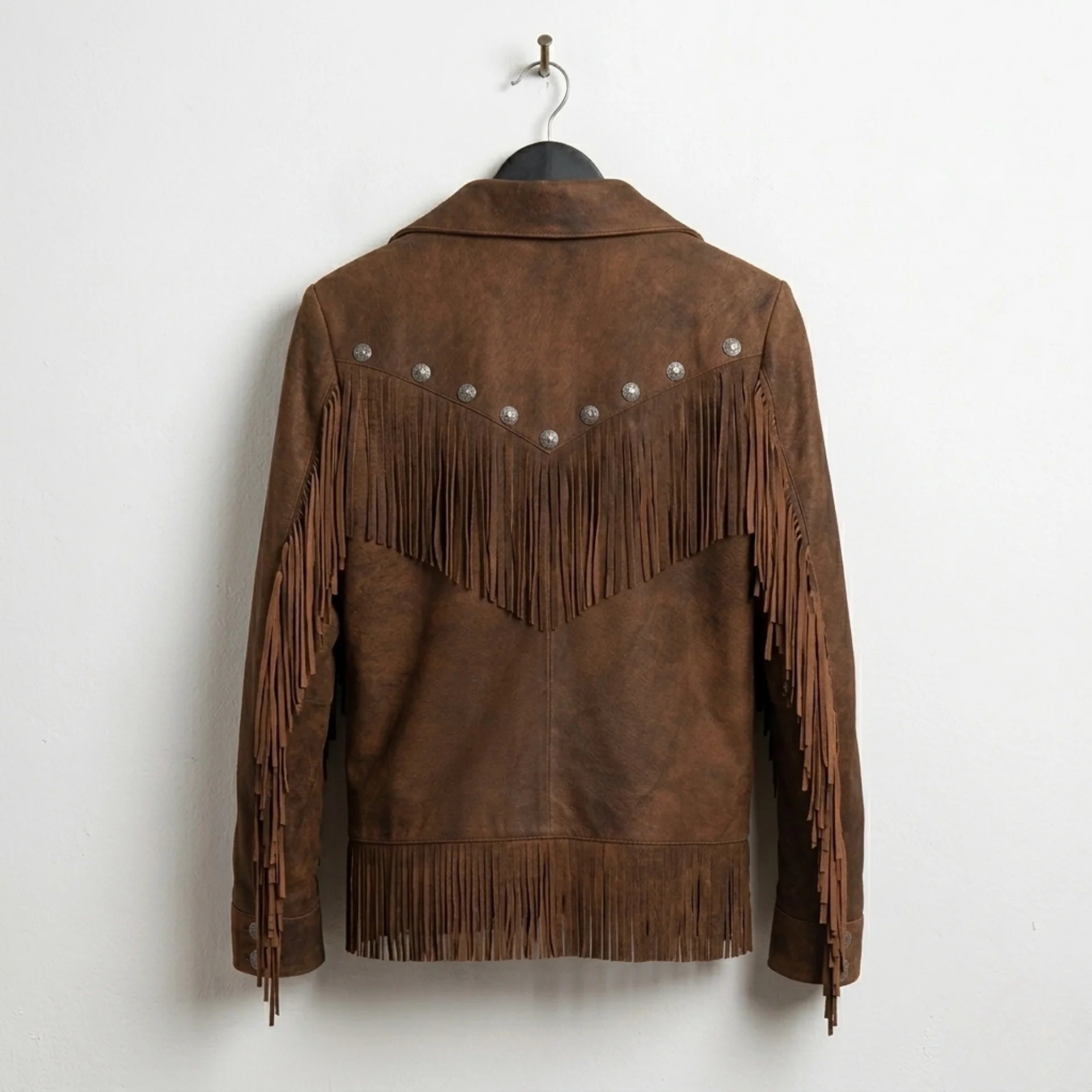 Back view of women’s western brown fringe leather jacket with yoke tassels