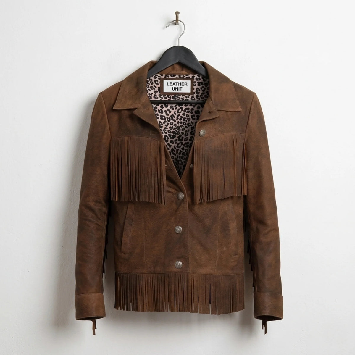 Front view of women’s brown fringe leather jacket with leopard lining by Leather Unit