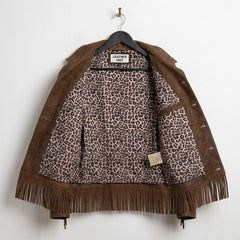 Inside view showing leopard-print lining of women’s brown fringe leather jacket