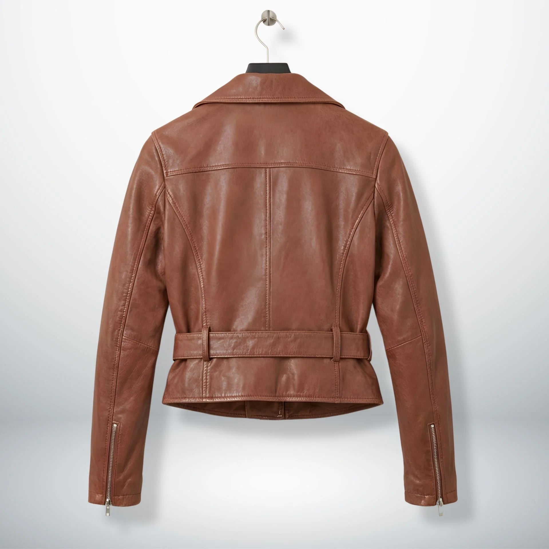 back view of women's tan brown leather biker jacket with belt.
