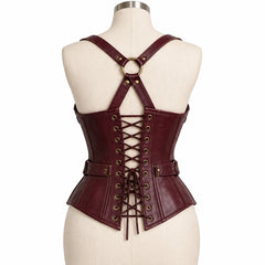 Rear view of deep plum leather gothic corset showing cross-laced back closure, shoulder harness and central O-ring.