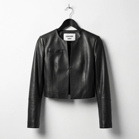 Front view of women's cropped black leather jacket with round neck by Leather Unit