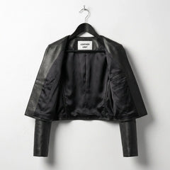 Inside view of women's black cropped leather jacket with full black lining