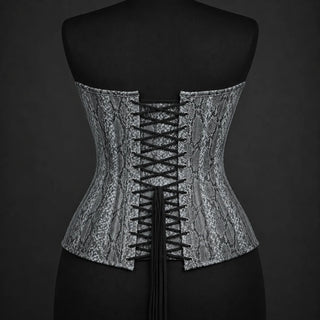 Back product view of grey snake print corset with adjustable black lacing and rows of silver-tone eyelets.