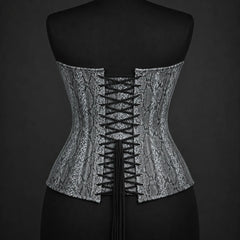 Back product view of grey snake print corset with adjustable black lacing and rows of silver-tone eyelets.