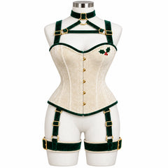 Front view of Winter Holly ivory velvet overbust corset harness with emerald green straps, gold-tone buckles and holly decoration.