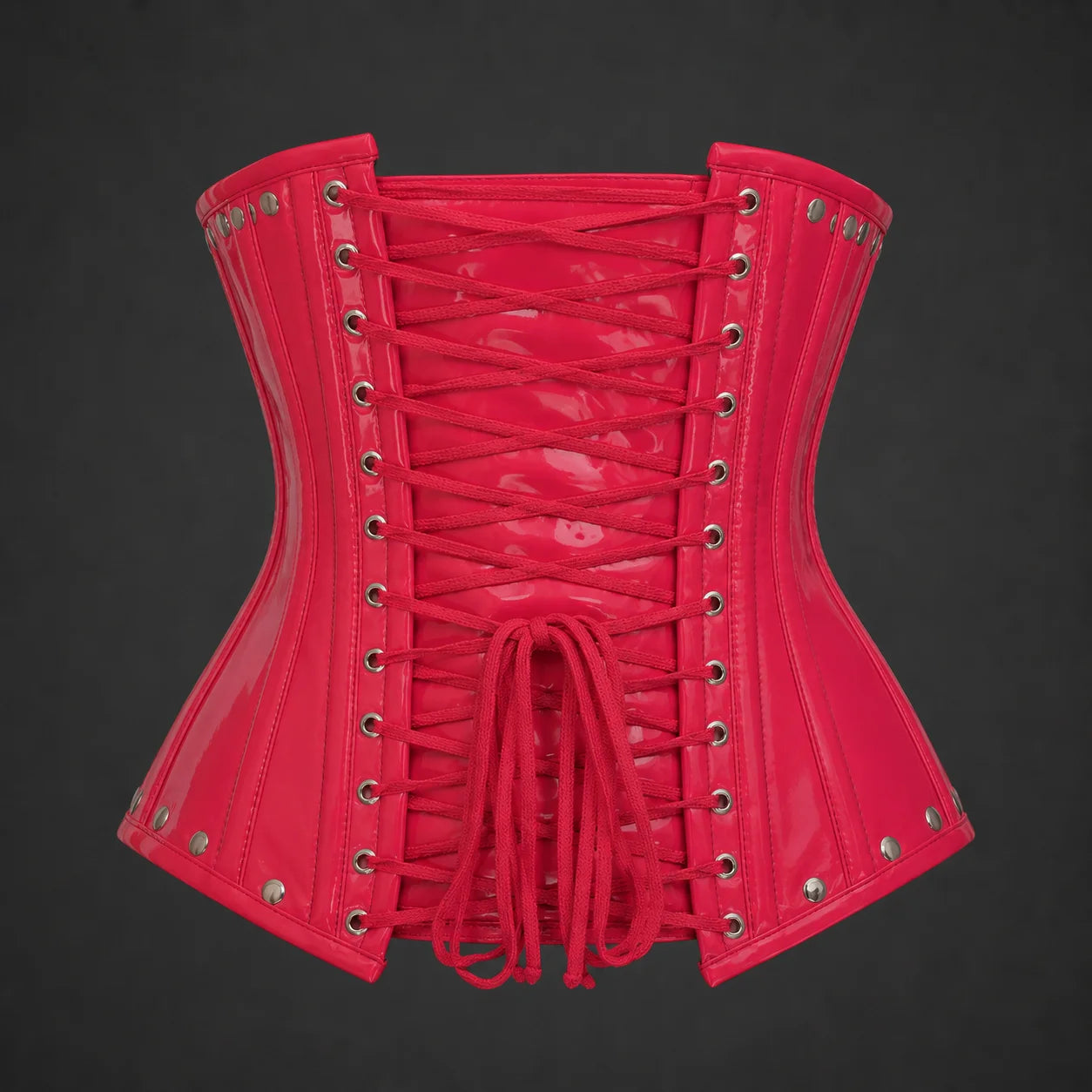 Back studio view of pink PVC underbust corset showing adjustable cross lacing, eyelets and panelled structure