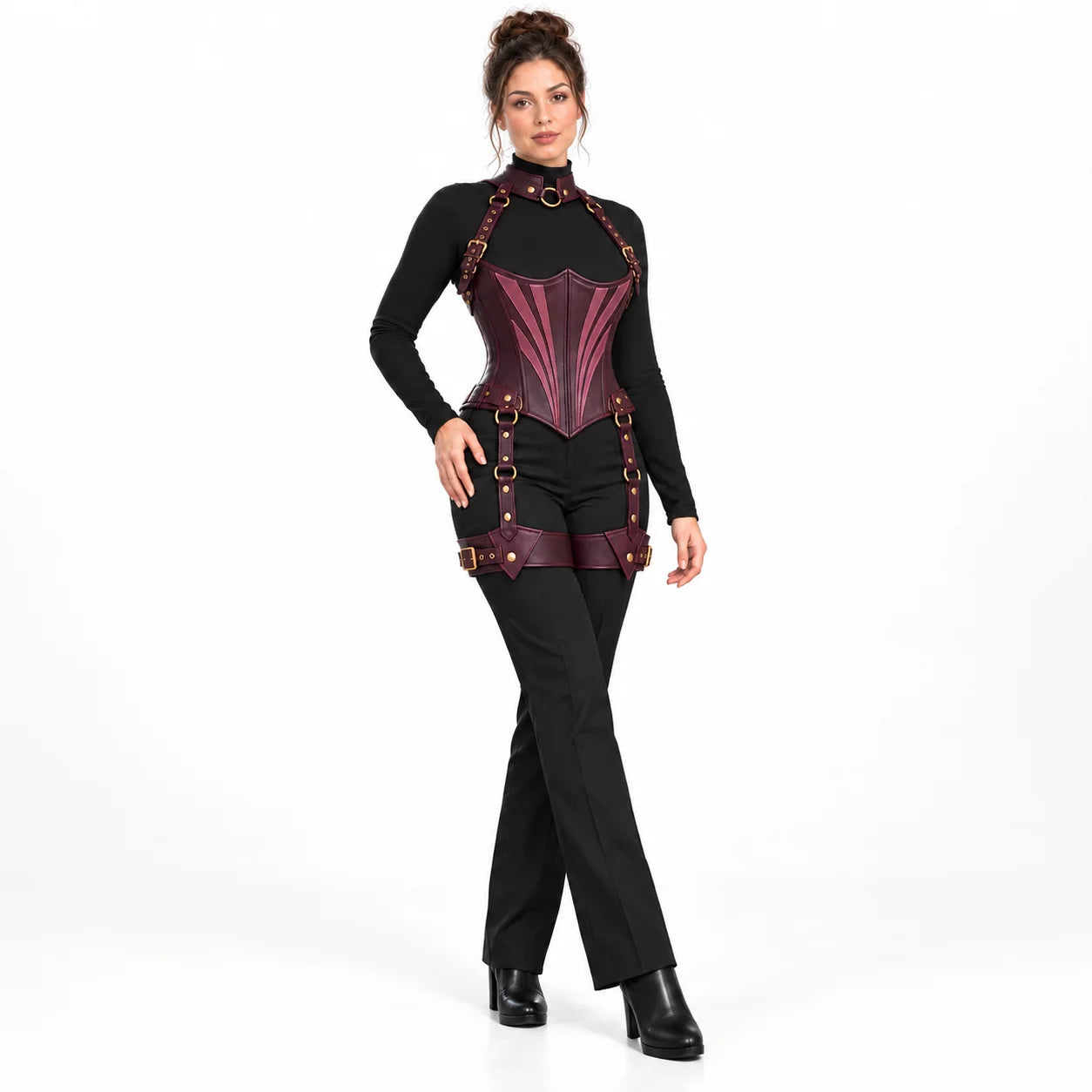 Woman wearing a plum Gothic underbust corset harness with fan-shaped front design and coordinated thigh cuffs on white.