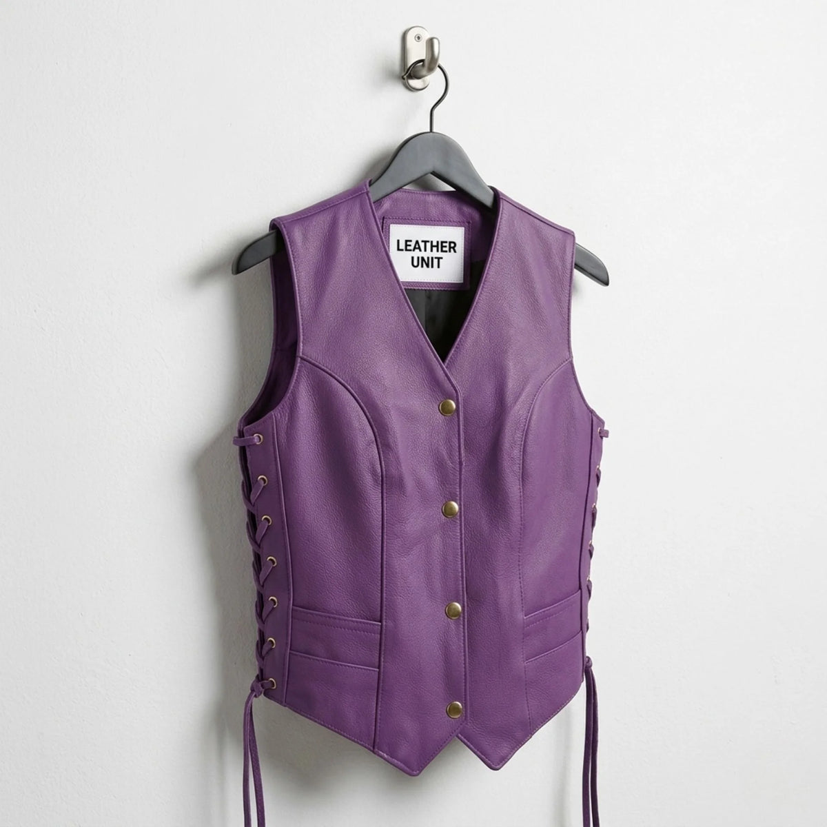 Front view of Leather Unit women’s purple leather vest with snap buttons