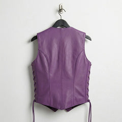 Back view of women’s purple leather vest showing pointed hem