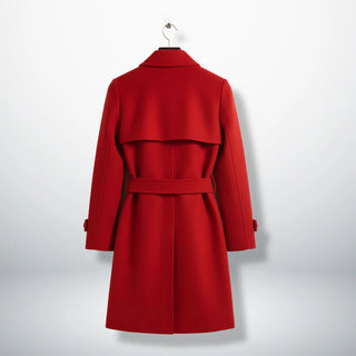 Back view of women’s red wool long coat with trench style storm flap