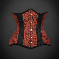 Front product view of red and black brocade steel boned underbust corset with black binding and silver-tone fastening