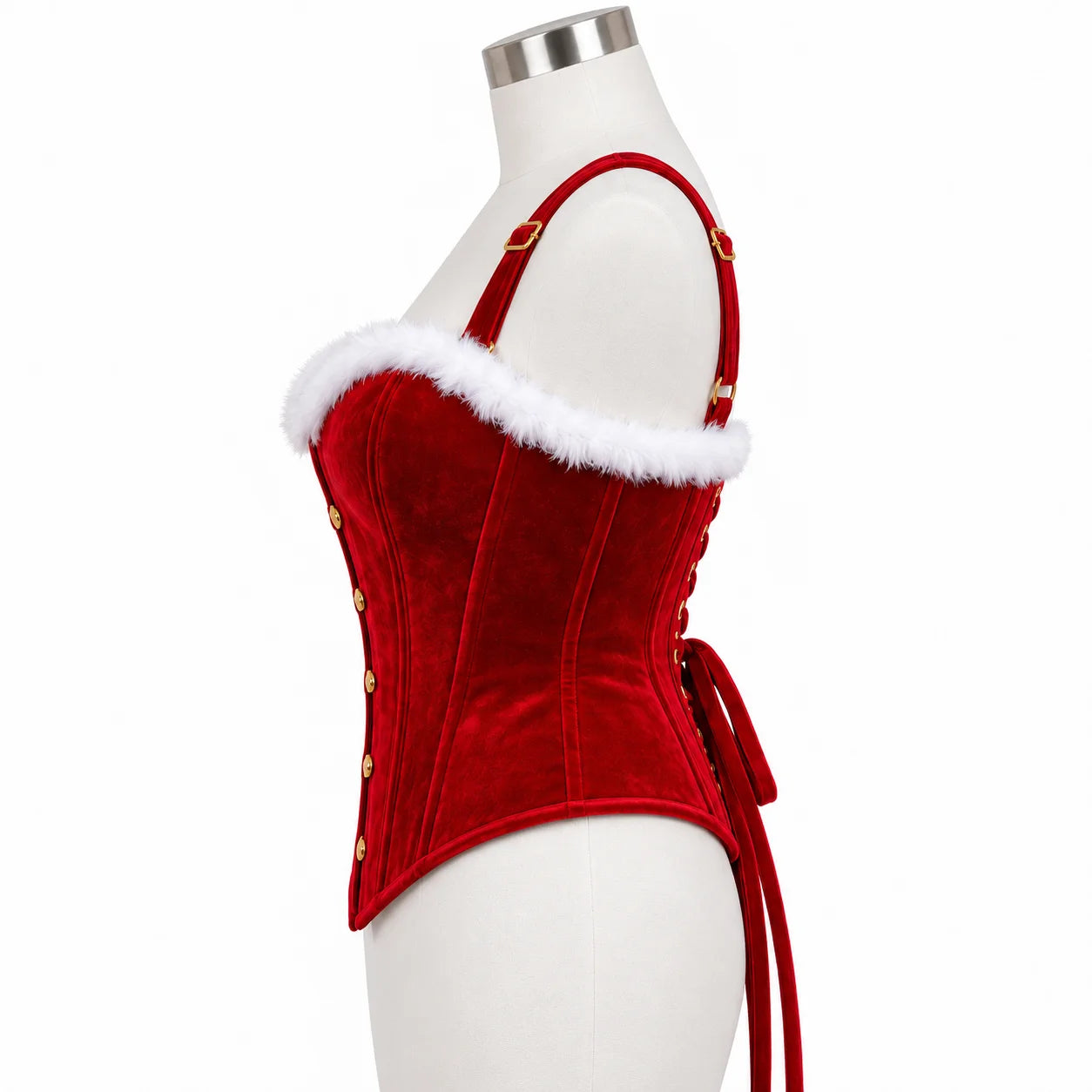 Side profile of red velvet overbust corset showing the contoured waist, sweetheart neckline, white trim and rear lacing.