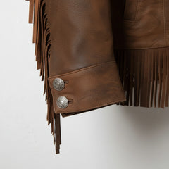 Cuff and concho snap detail on women’s western fringe leather jacket